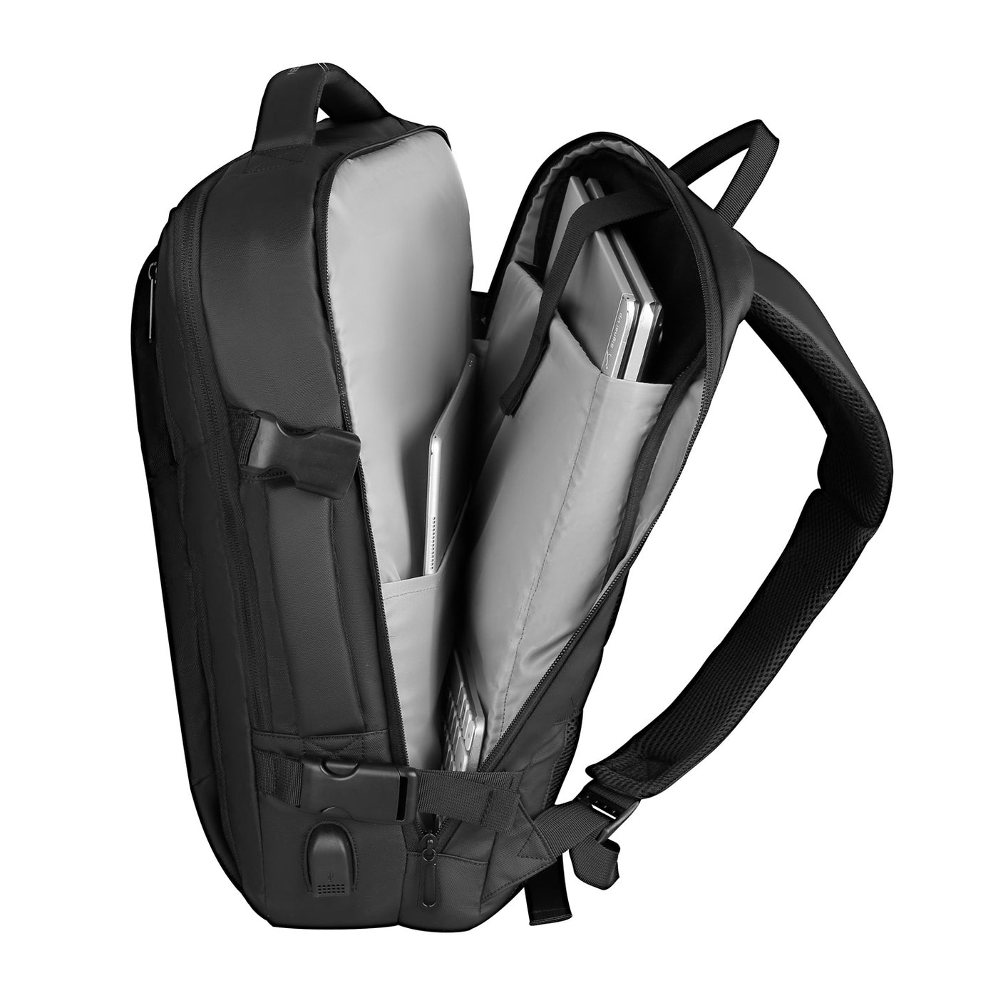 Inside of Mark Ryden minimal black USB Charging backpack. 